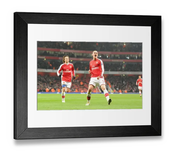Framed Print : Arsenal's Unforgettable Triumph: Vermaelen and Rosicky's Goal Celebration (4:2) vs. Bolton Wanderers, 2010