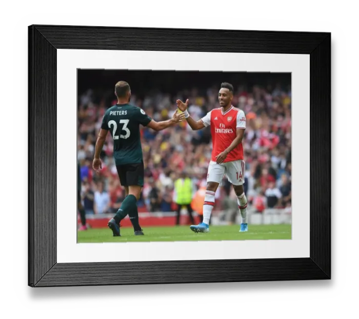 Framed Print : Arsenal's Aubameyang Celebrates with Burnley's Pieters after Intense Arsenal v Burnley Clash (2019-20)