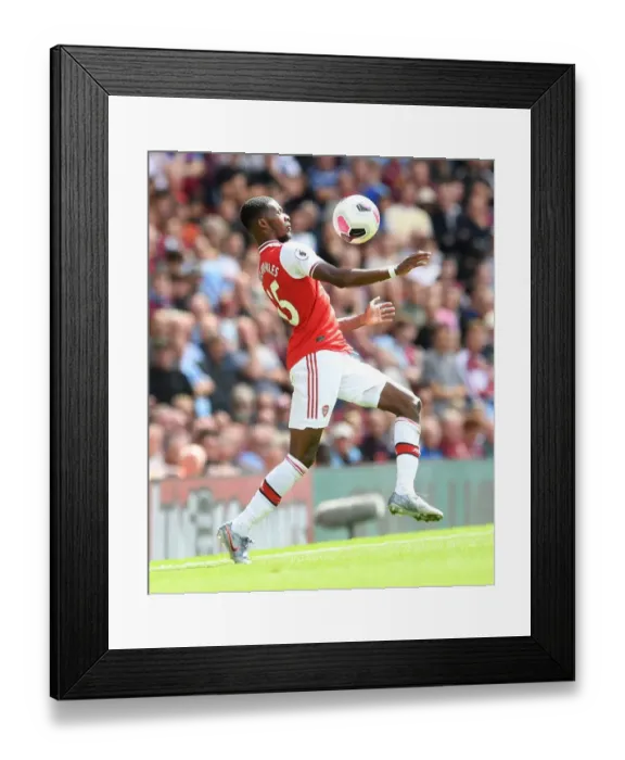 Framed Print : Arsenal's Ainsley Maitland-Niles in Action against Burnley in 2019-20 Premier League Framed Print : Arsenal's Ainsley Maitland-Niles in Action against Burnley in 2019-20 Premier League