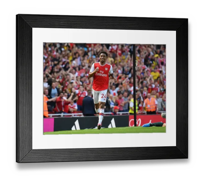 Framed Print : Arsenal's Reiss Nelson Shines in Premier League Clash Against Burnley
