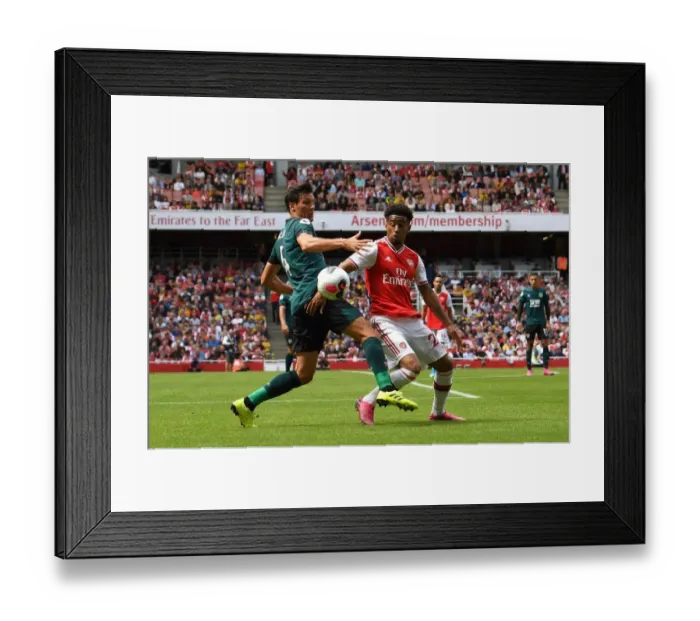 Framed Print : Arsenal's Reiss Nelson Clashes with Burnley's Jack Cork in Premier League Showdown Framed Print : Arsenal's Reiss Nelson Clashes with Burnley's Jack Cork in Premier League Showdown