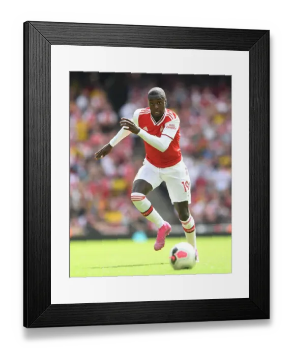 Framed Print : Arsenal's Nicolas Pepe in Action: Premier League Clash Against Burnley, 2019-20