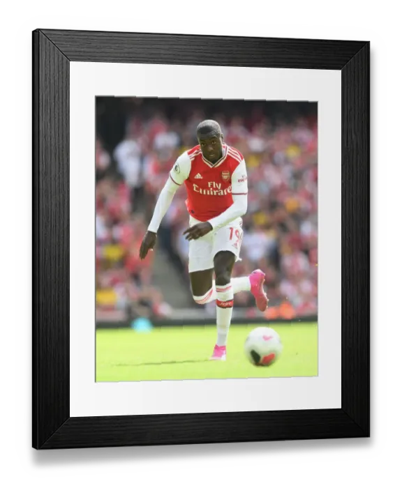Framed Print : Arsenal's Nicolas Pepe Shines in Arsenal FC vs Burnley FC Premier League Clash (2019-20)
