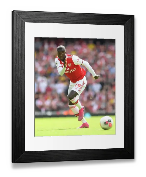 Framed Print : Arsenal's Nicolas Pepe in Action: Premier League Clash against Burnley, 2019-20