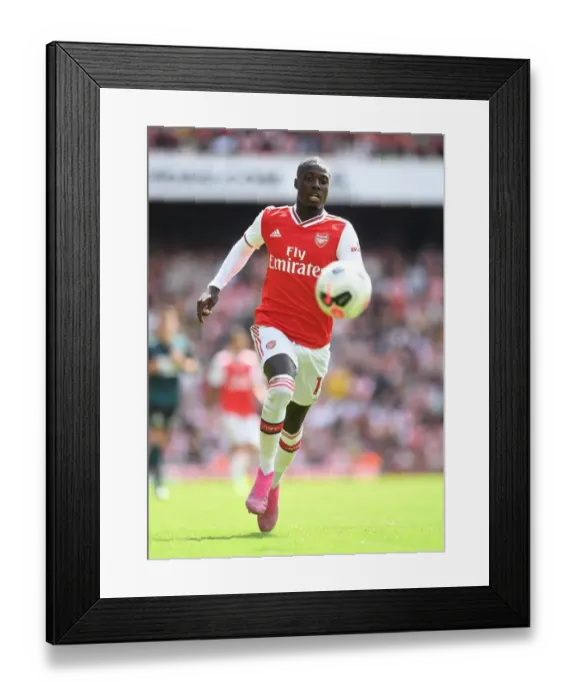 Framed Print : Arsenal's Nicolas Pepe Shines in Premier League Clash Against Burnley