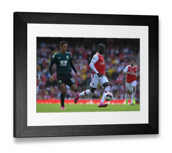 Framed Print : Intense Battle: Pepe vs. McNeil, Arsenal vs. Burnley, Premier League 2019-20 Framed Print : Intense Battle: Pepe vs. McNeil, Arsenal vs. Burnley, Premier League 2019-20