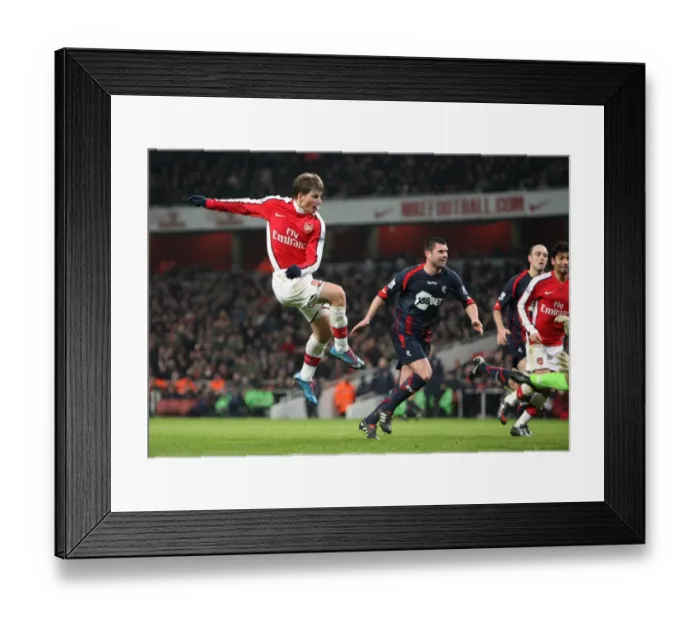 Framed Print : Arsenal's Triumph: 4-2 Victory Over Bolton Wanderers in Barclays Premier League (2010)