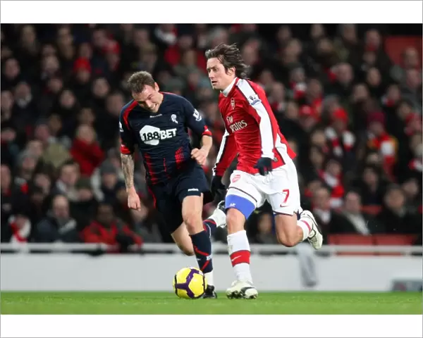 Tomas Rosicky (Arsenal) Matthew Taylor (Bolton). Arsenal 4: 2 Bolton Wanderers