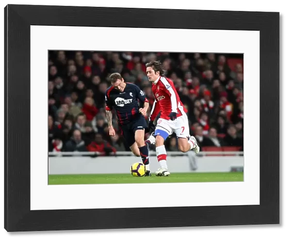 Tomas Rosicky (Arsenal) Matthew Taylor (Bolton). Arsenal 4: 2 Bolton Wanderers