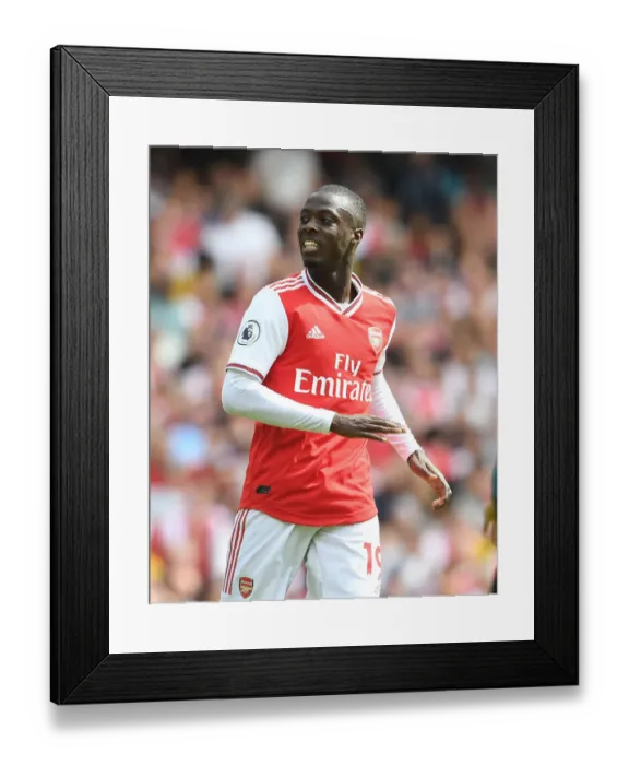 Framed Print : Arsenal's Nicolas Pepe in Action: Premier League Clash against Burnley, 2019-20
