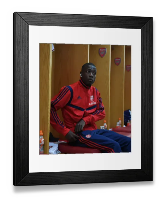 Framed Print : Arsenal's Nicolas Pepe: Pre-Match Focus and Determination at Emirates Stadium (2019-20 Arsenal vs Burnley) Framed Print : Arsenal's Nicolas Pepe: Pre-Match Focus and Determination at Emirates Stadium (2019-20 Arsenal vs Burnley)
