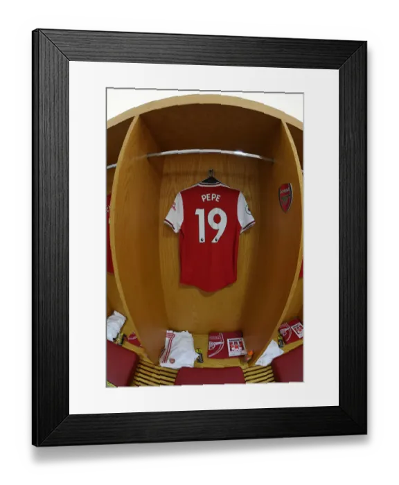 Framed Print : Arsenal: Pre-Match Room - Arsenal FC vs Burnley FC, Premier League (Nicolas Pepe's Jersey on Display)
