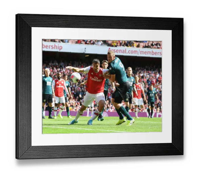 Framed Print : Arsenal vs Burnley: Sokratis and Chris Wood Clash in Premier League Showdown
