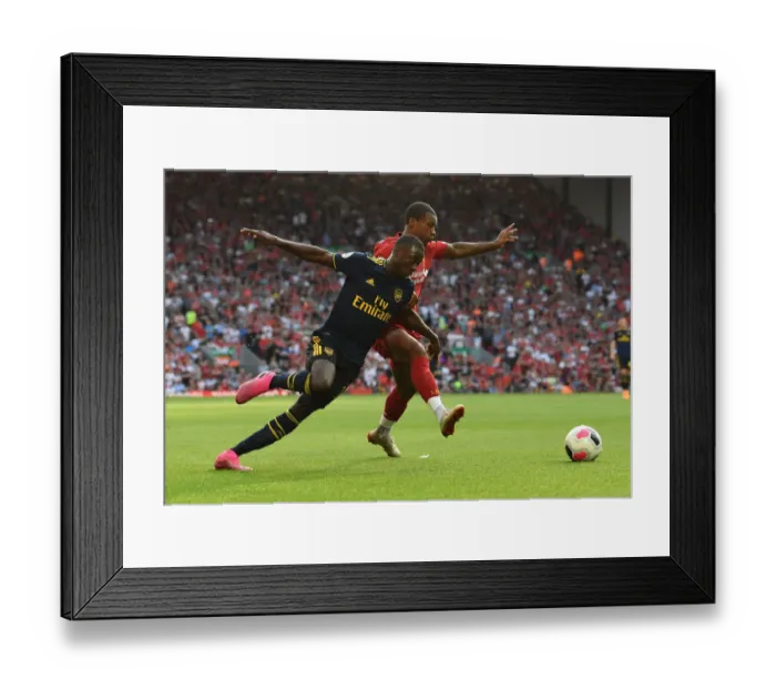 Framed Print : Pepe vs. Wijnaldum: Liverpool vs. Arsenal, Premier League Showdown (2019-20) Framed Print : Pepe vs. Wijnaldum: Liverpool vs. Arsenal, Premier League Showdown (2019-20)