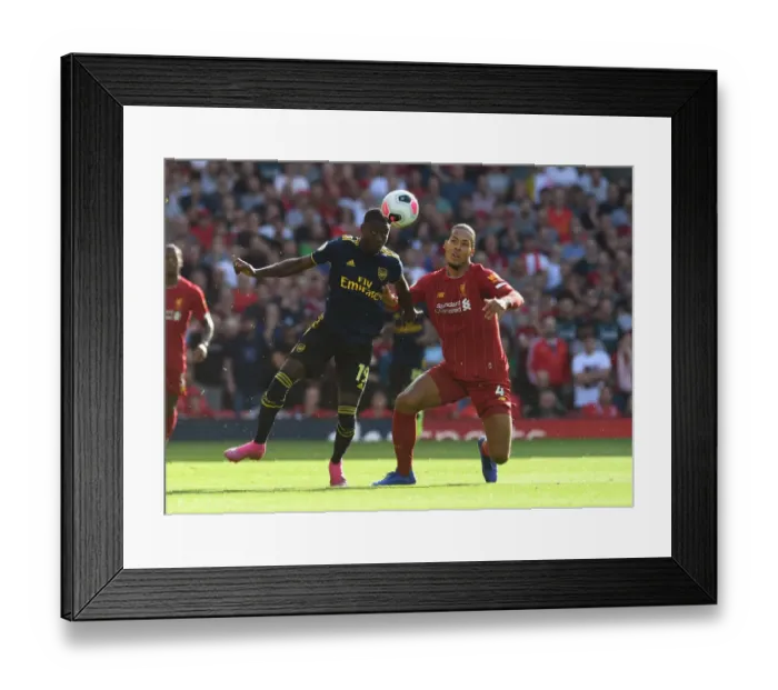 Framed Print : Clash of Titans: Pepe vs. Van Dijk - Liverpool vs. Arsenal, Premier League 2019-20