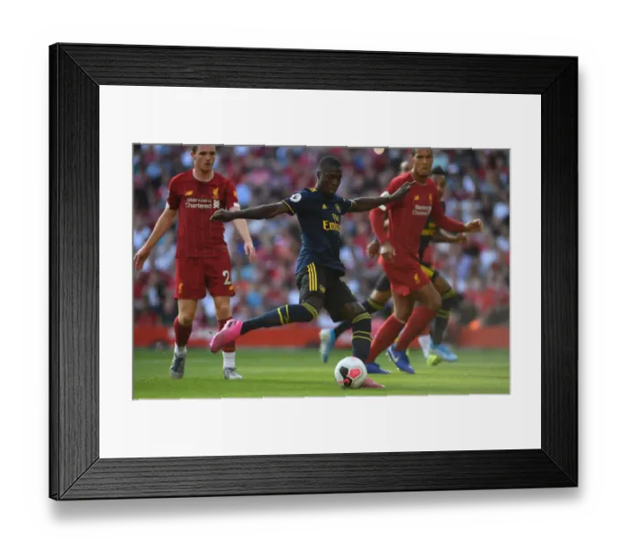 Framed Print : Arsenal's Pepe Goes Head-to-Head with Liverpool: Premier League Showdown, 2019-20