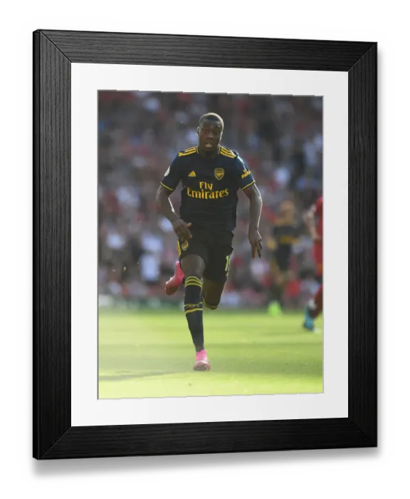 Framed Print : Arsenal's Pepe Faces Off Against Liverpool in Premier League Showdown 2019-20 Framed Print : Arsenal's Pepe Faces Off Against Liverpool in Premier League Showdown 2019-20