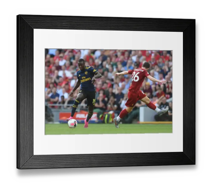 Framed Print : Nicolas Pepe Evades Andy Robertson: Liverpool vs. Arsenal, Premier League 2019-20