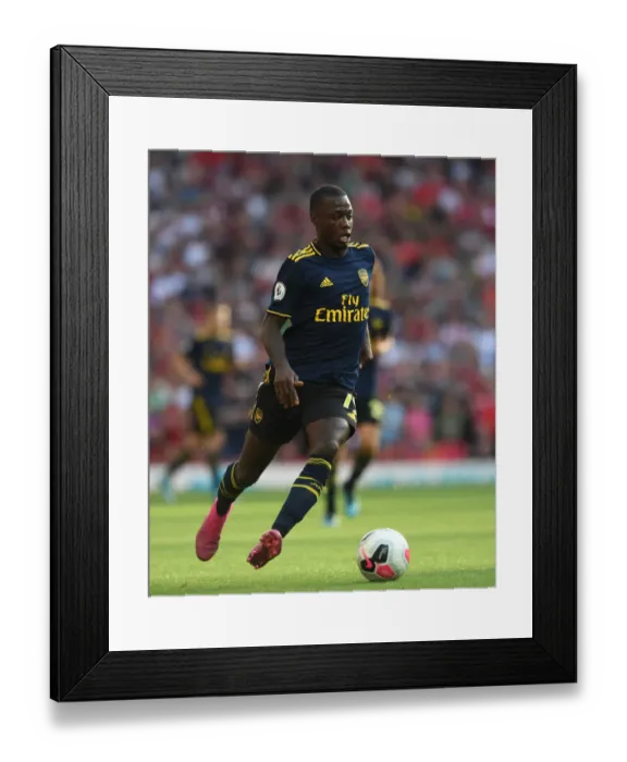 Framed Print : Nicolas Pepe Faces Off Against Liverpool: Arsenal vs. Liverpool, Premier League 2019-20