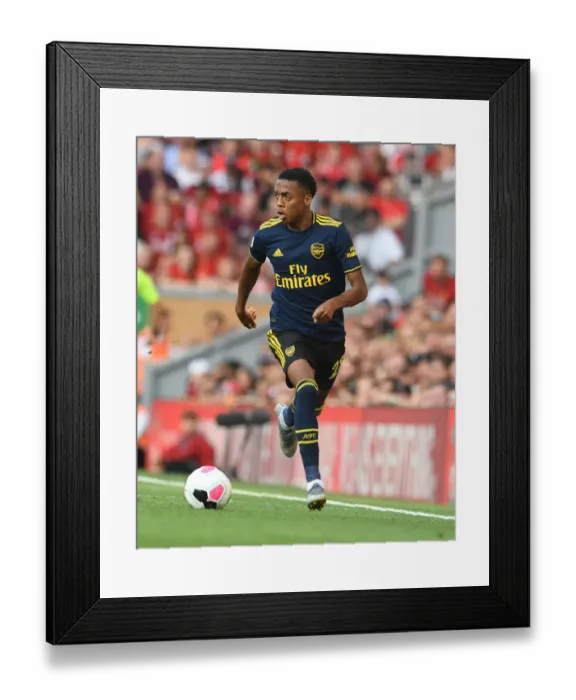 Framed Print : Joe Willock vs Liverpool: Arsenal Midfielder Faces Anfield Challenge in Premier League Clash