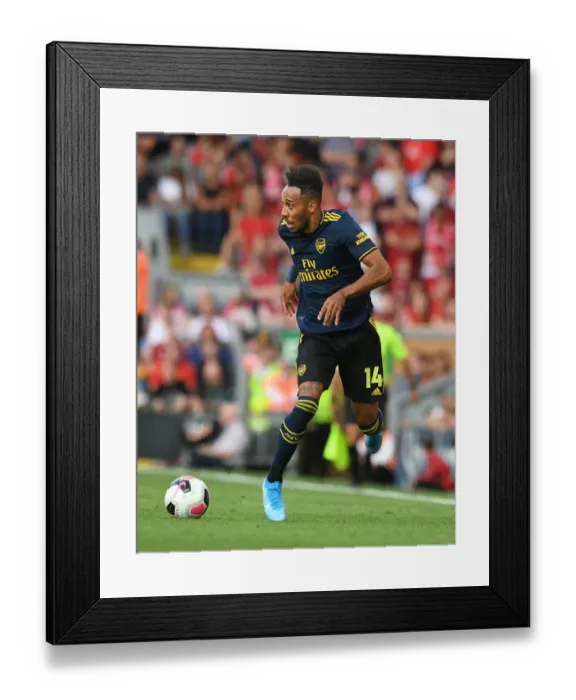 Framed Print : Pierre-Emerick Aubameyang Faces Off Against Liverpool in Premier League Clash
