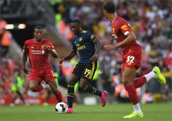 Pepe vs Wijnaldum: A Premier League Battle at Anfield, 2019