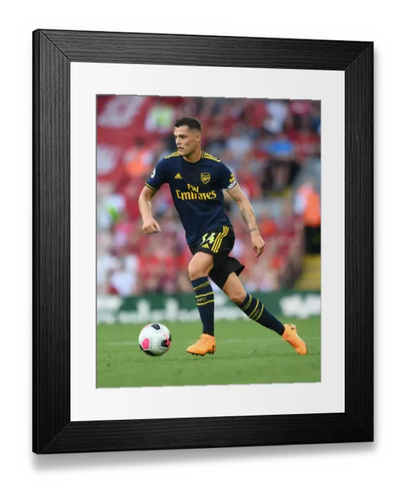 Framed Print : Granit Xhaka at Anfield: Liverpool vs. Arsenal, Premier League 2019-20 Framed Print : Granit Xhaka at Anfield: Liverpool vs. Arsenal, Premier League 2019-20
