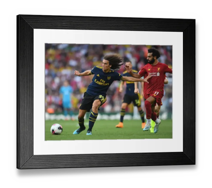 Framed Print : Guendouzi vs. Salah: Liverpool vs. Arsenal Clash in Premier League (2019-20) Framed Print : Guendouzi vs. Salah: Liverpool vs. Arsenal Clash in Premier League (2019-20)