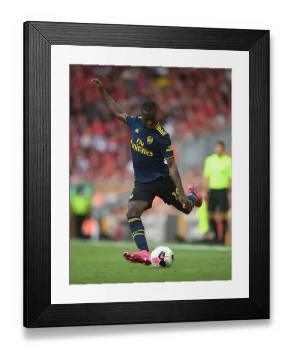 Framed Print : Nicolas Pepe vs. Liverpool: Arsenal's Star Forward Battles in Premier League Showdown