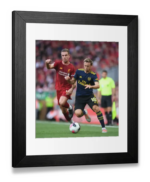 Framed Print : Monreal vs. Henderson: Intense Rivalry Unfolds at Anfield - Liverpool vs. Arsenal, Premier League 2019-20 Framed Print : Monreal vs. Henderson: Intense Rivalry Unfolds at Anfield - Liverpool vs. Arsenal, Premier League 2019-20
