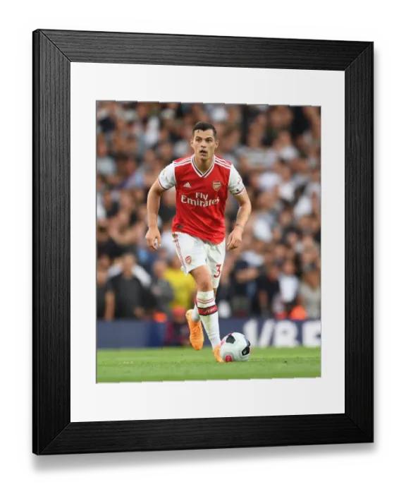 Framed Print : Arsenal's Granit Xhaka in Action Against Tottenham in the 2019-20 Premier League Framed Print : Arsenal's Granit Xhaka in Action Against Tottenham in the 2019-20 Premier League
