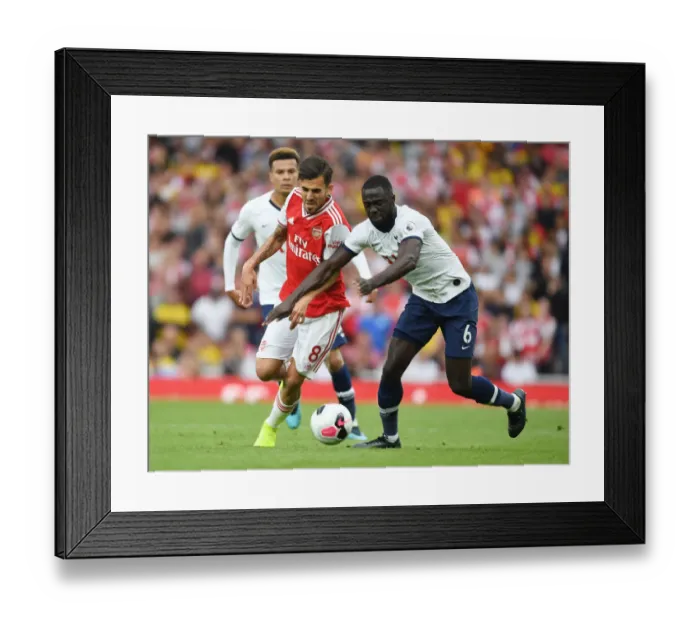 Framed Print : Arsenal vs. Tottenham: A Premier League Rivalry Fueled by Passion and Skill at the Emirates Framed Print : Arsenal vs. Tottenham: A Premier League Rivalry Fueled by Passion and Skill at the Emirates