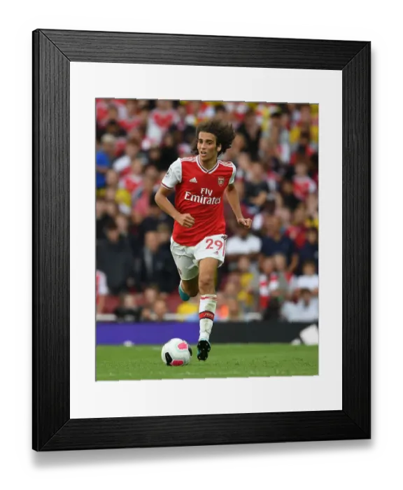 Framed Print : Arsenal's Guendouzi Faces Off Against Tottenham in Premier League Clash Framed Print : Arsenal's Guendouzi Faces Off Against Tottenham in Premier League Clash