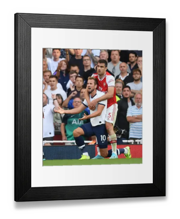 Framed Print : Clash of the Capital Rivals: Sokratis vs. Kane - Arsenal vs. Tottenham, Premier League 2019-20 Framed Print : Clash of the Capital Rivals: Sokratis vs. Kane - Arsenal vs. Tottenham, Premier League 2019-20