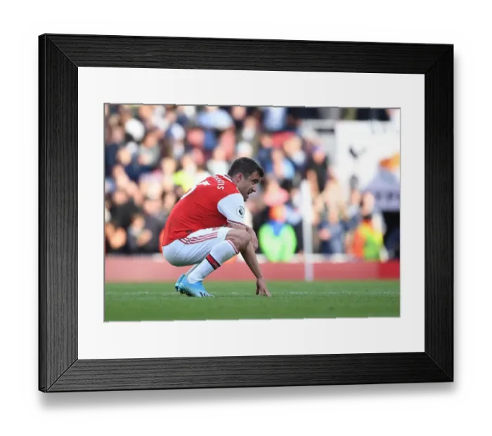 Framed Print : Arsenal's Sokratis Reacts After Arsenal vs. Tottenham Premier League Clash (2019-20)