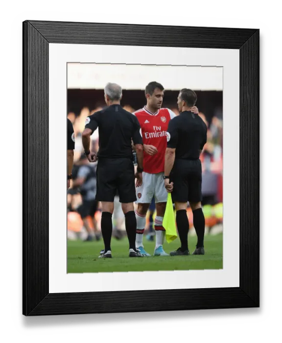 Framed Print : Arsenal's Sokratis Contests Referee Decision During Arsenal v Tottenham Premier League Clash
