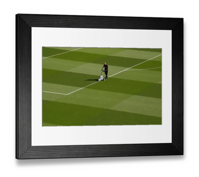 Framed Print : Arsenal vs. Tottenham: Preparing for the Big Battle at Emirates Stadium
