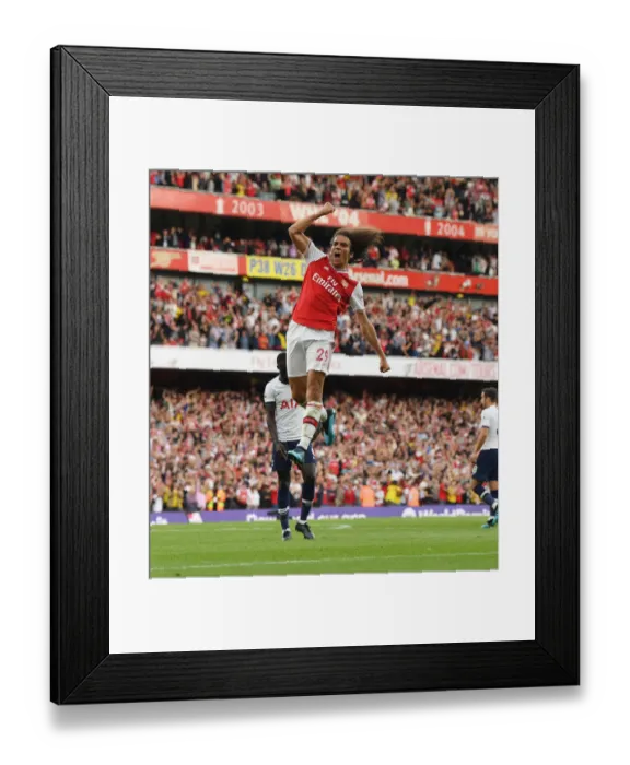 Framed Print : Arsenal's Aubameyang Scores Brace Against Tottenham: Guendouzi's Thrilling Celebration (2019-20 Premier League)