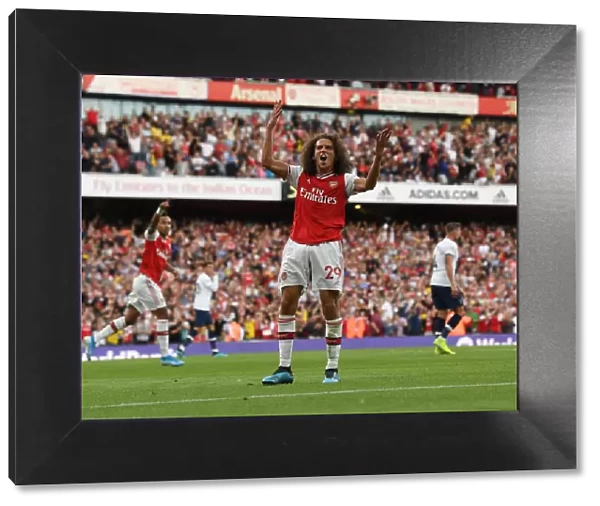 Arsenal's Aubameyang Scores Brace Against Tottenham: Guendouzi's Exuberant Celebration (2019-20 Premier League)