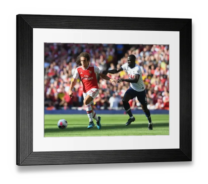 Framed Print : Arsenal vs. Tottenham: Matteo Guendouzi vs. Davinson Sanchez Clash in the Premier League Framed Print : Arsenal vs. Tottenham: Matteo Guendouzi vs. Davinson Sanchez Clash in the Premier League