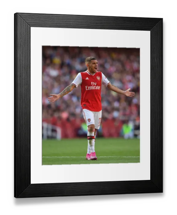 Framed Print : Arsenal's Torreira Faces Off Against Tottenham in Premier League Clash Framed Print : Arsenal's Torreira Faces Off Against Tottenham in Premier League Clash