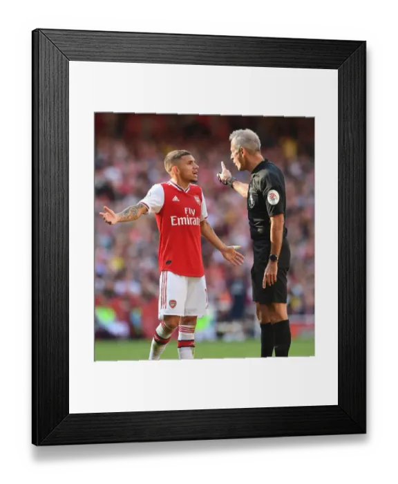 Framed Print : Arsenal's Torreira Argues with Referee during Arsenal v Tottenham Premier League Clash