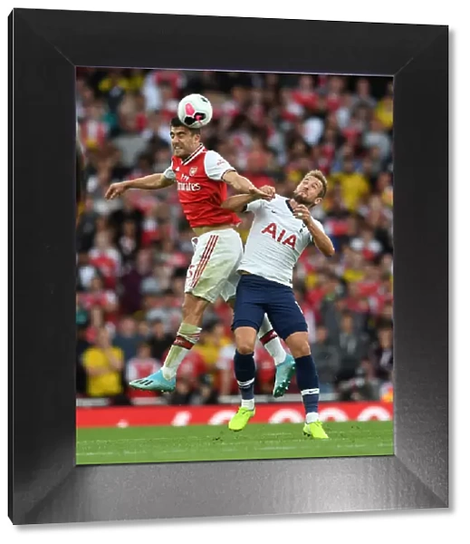 Arsenal vs. Tottenham: Sokratis and Kane Clash in Intense Premier League Showdown