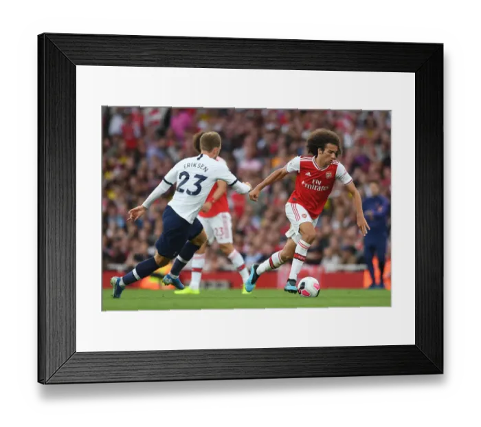Framed Print : Battle of Midfield Titans: Guendouzi vs. Eriksen - Arsenal vs. Tottenham Premier League Showdown Framed Print : Battle of Midfield Titans: Guendouzi vs. Eriksen - Arsenal vs. Tottenham Premier League Showdown