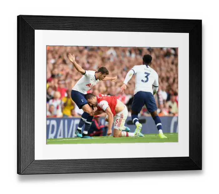 Framed Print : Arsenal vs. Tottenham: Sokratis vs. Winks in Intense Premier League Clash Framed Print : Arsenal vs. Tottenham: Sokratis vs. Winks in Intense Premier League Clash