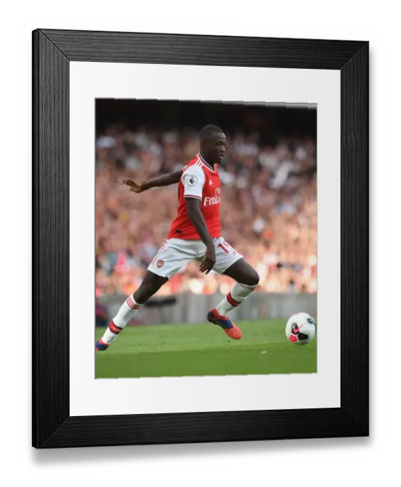 Framed Print : Pepe vs. Tottenham: Intense Head-to-Head Clash in Arsenal's Premier League Showdown Framed Print : Pepe vs. Tottenham: Intense Head-to-Head Clash in Arsenal's Premier League Showdown