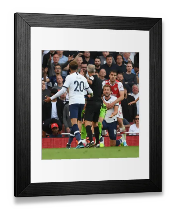 Framed Print : Arsenal vs. Tottenham: A Moment of Sportsmanship Amidst Rivalry (2019-20)