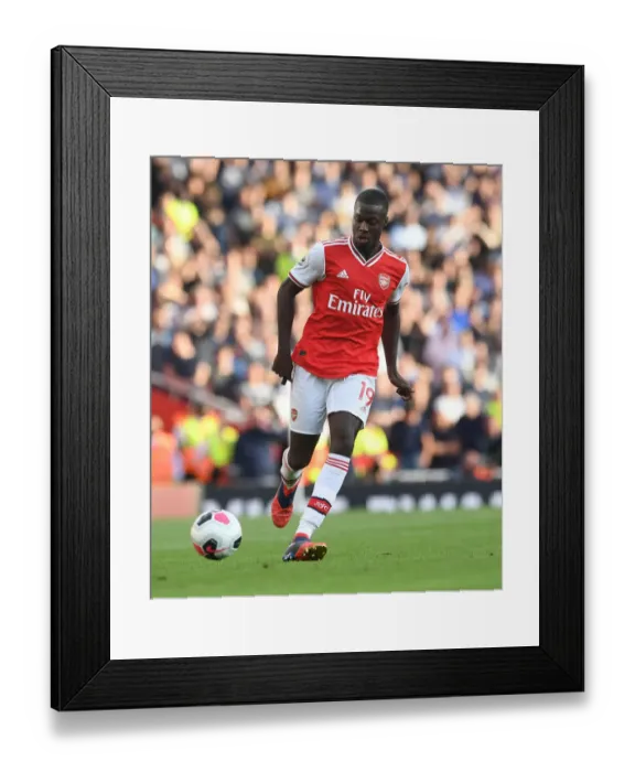 Framed Print : Pepe vs. Tottenham: Intense Head-to-Head Battle at the Emirates