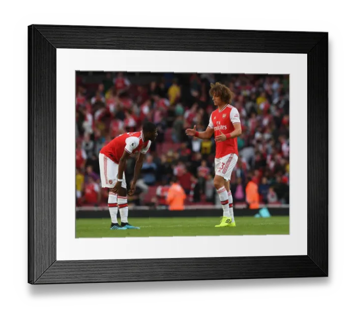 Framed Print : Arsenal vs. Tottenham: Luiz and Maitland-Niles Share a Moment After Intense Rivalry Framed Print : Arsenal vs. Tottenham: Luiz and Maitland-Niles Share a Moment After Intense Rivalry