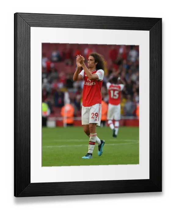 Framed Print : Arsenal's Guendouzi Celebrates with Fans after Arsenal vs. Tottenham Match, 2019-20 Premier League Framed Print : Arsenal's Guendouzi Celebrates with Fans after Arsenal vs. Tottenham Match, 2019-20 Premier League